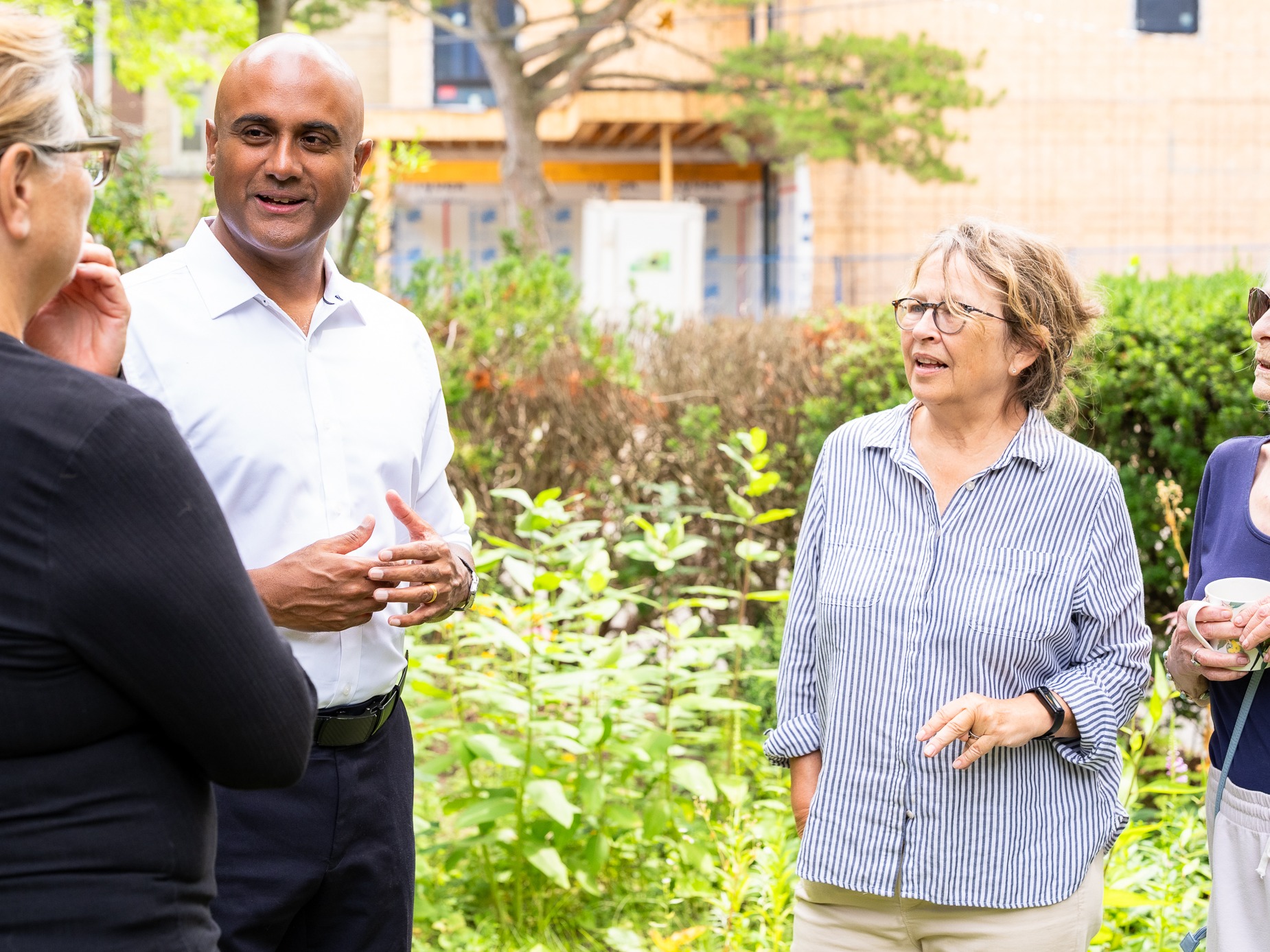 Parthi Kandavel speaking with residents at a Scarborough Southwest community event